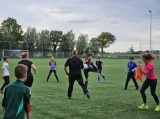 Laatste training S.K.N.W.K. JO11-1JM (partijtje tegen de ouders) van maandag 27 mei 2024 (126/137)